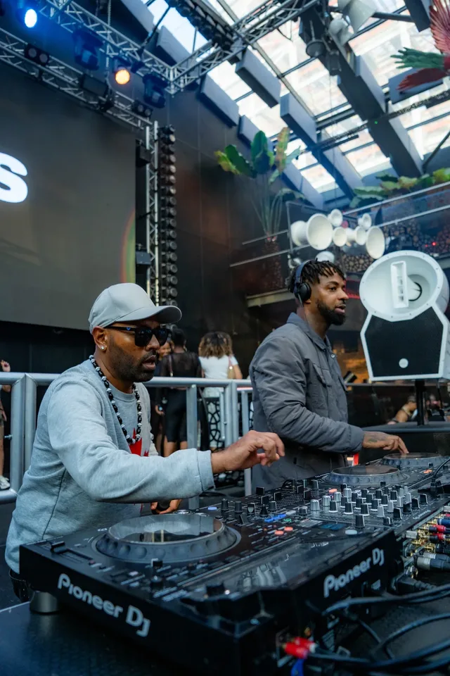 Two artists sharing the Stepps House DJ booth.