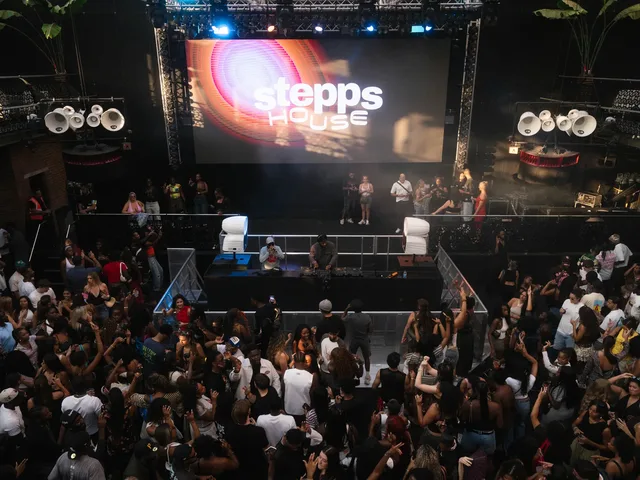 The Stepps House crowd facing the stage and DJ booth.